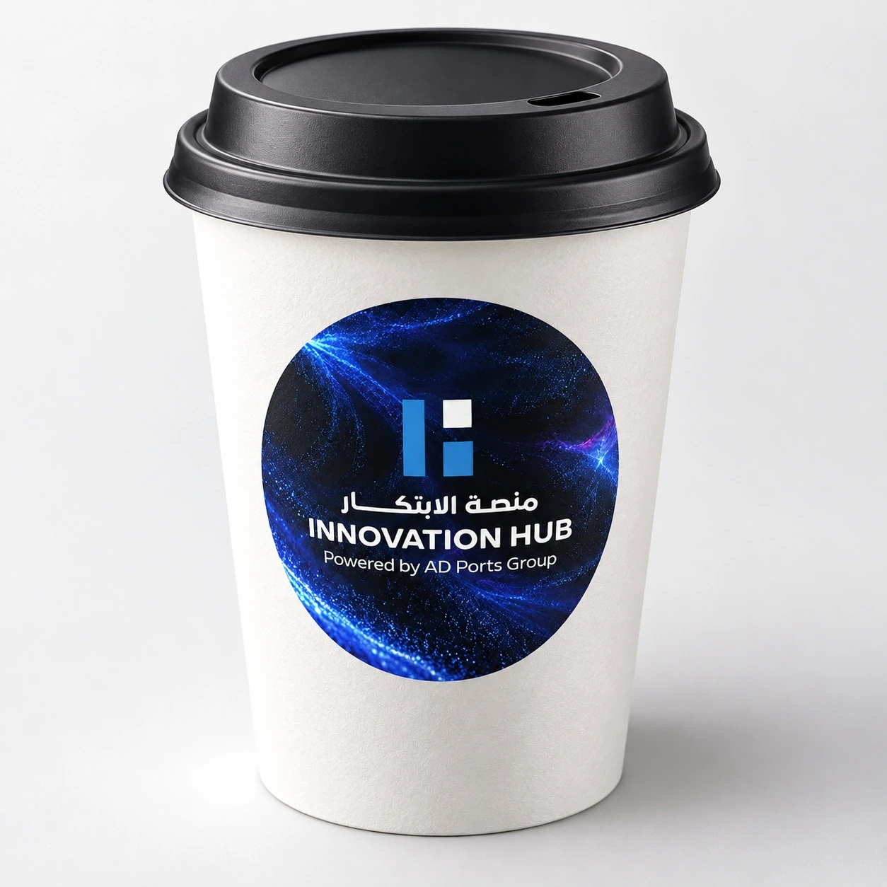 Illustrative cup mockup with an Innovation Hub round sticker
