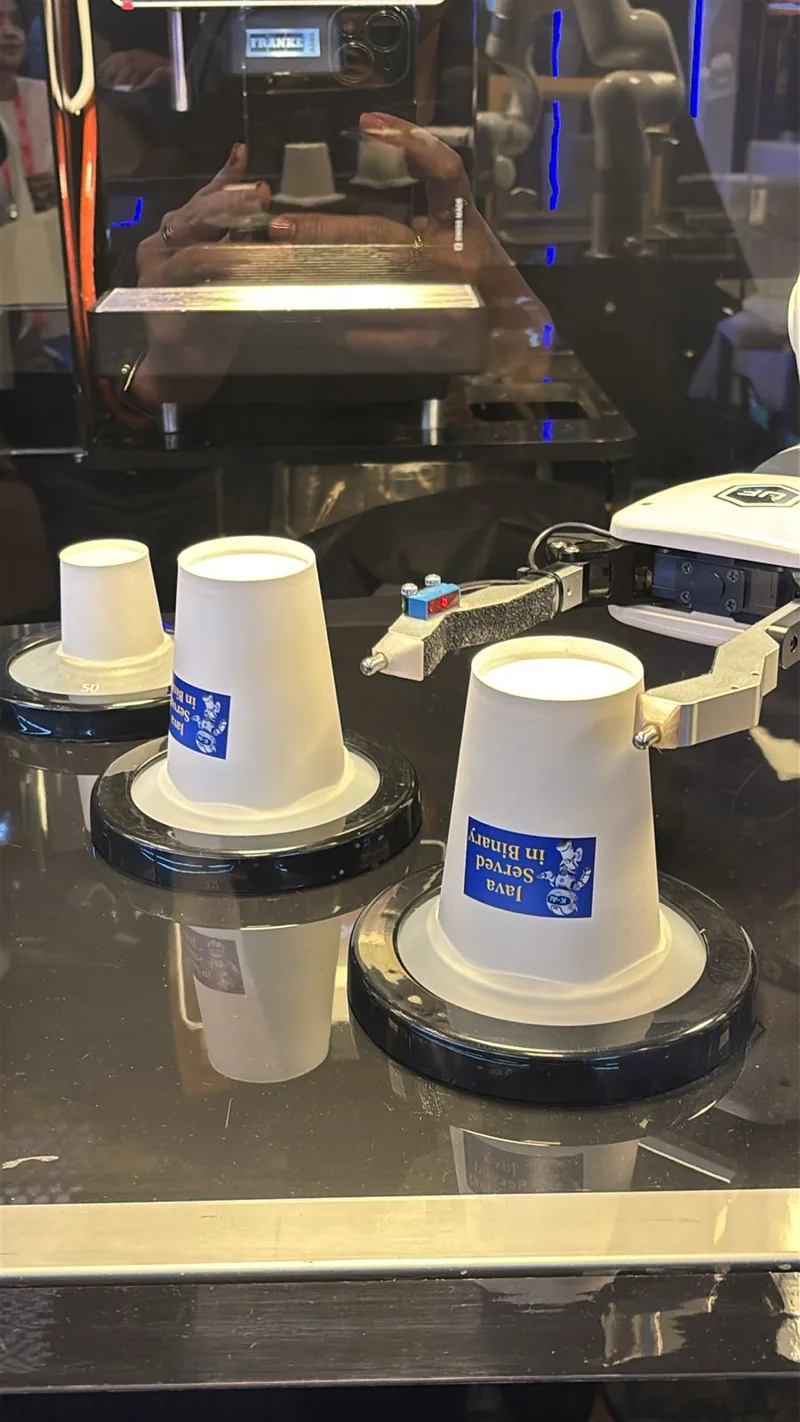 Branded coffee cups served by Cafe Xbot Grande